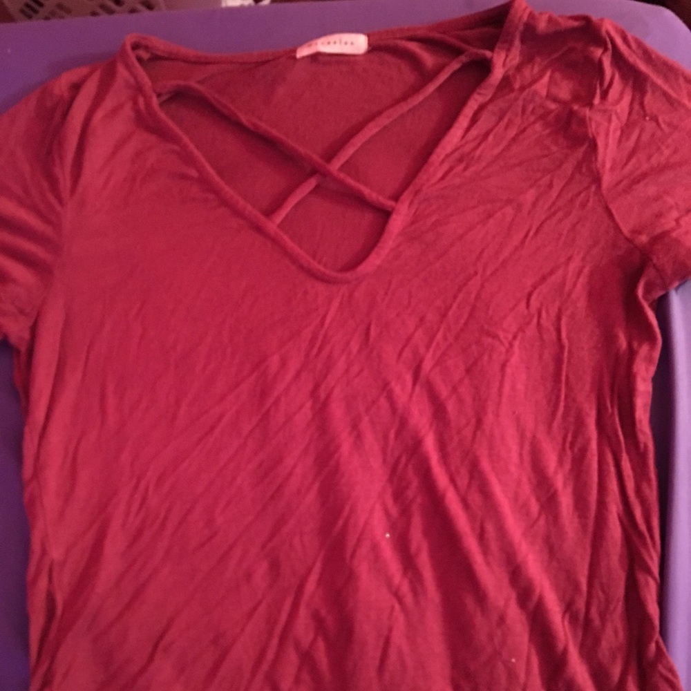 hot pink cris cross v neck shirt